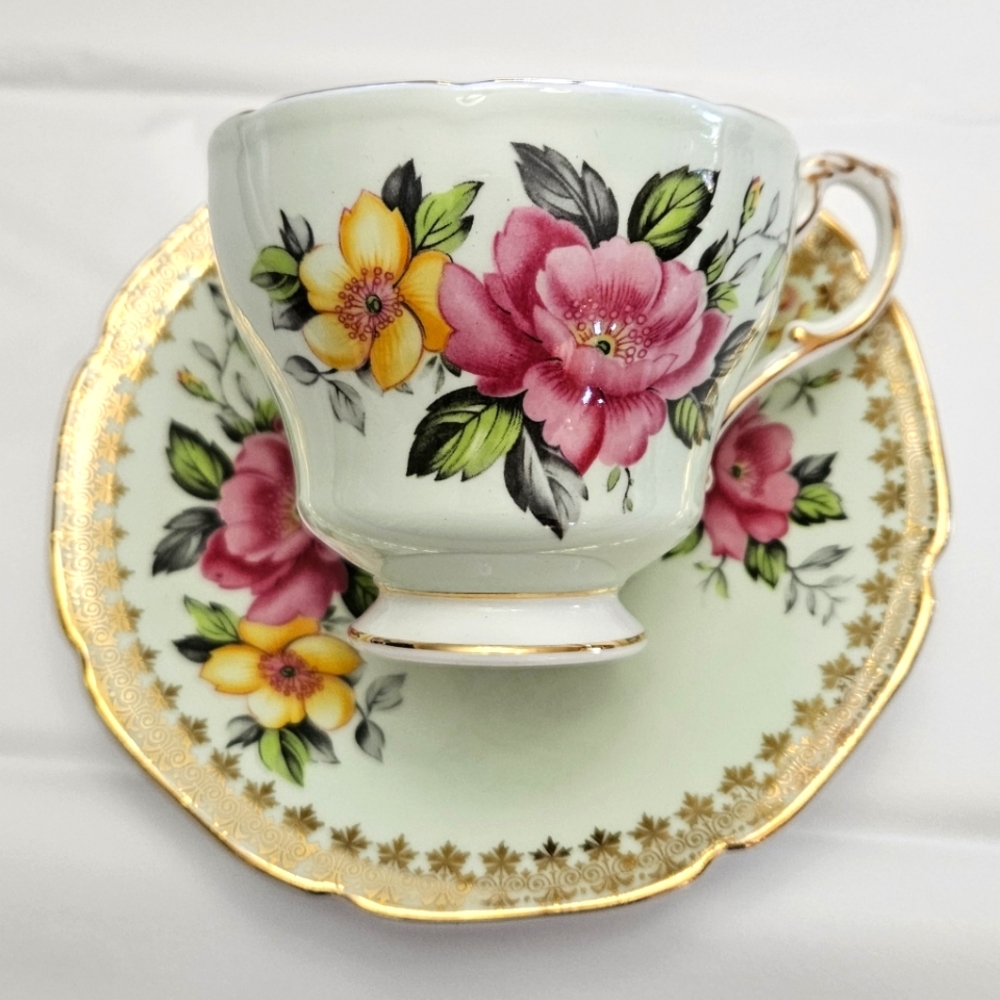 Beautiful Paragon, pale green with floral, cup, and saucer.
